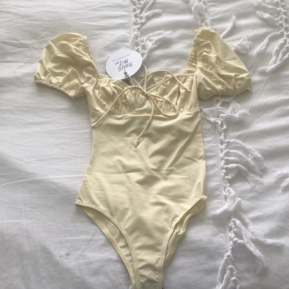 Yellow bodysuit